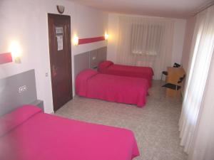 Postel nebo postele na pokoji v ubytování Hospedaje Luciano + 28 fotografií