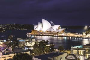 a view of the sydney opera house at night at Rendezvous Hotel Sydney The Rocks in Sydney