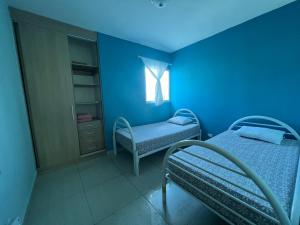 Een bed of bedden in een kamer bij Coti’s house