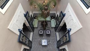 an overhead view of a room with clocks on the wall at Riad Dar Alma Fes in Fès