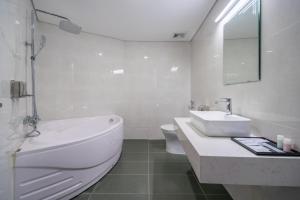 Ένα μπάνιο στο Jacayl Hotel TCG
