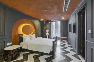 Ένα ή περισσότερα κρεβάτια σε δωμάτιο στο Jacayl Hotel TCG