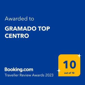 Ett certifikat, pris eller annat dokument som visas upp på GRAMADO TOP CENTRO