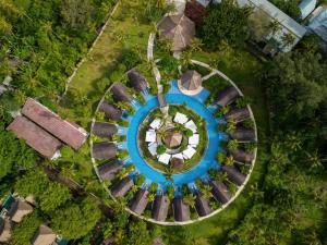 an overhead view of a blue pool in a park at Gili Air Lagoon Resort By Waringin Hospitality in Gili Islands