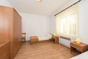 Postel nebo postele na pokoji v ubytování Apartment Katarina