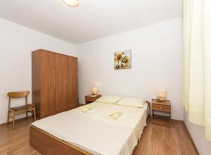 Postel nebo postele na pokoji v ubytování Apartment Katarina
