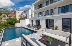 an image of a house with a swimming pool at Beach Front Home In Prizna With House Sea View in Prizna