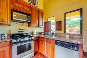 a kitchen with a stove and a sink at Casita at Morningstar Breeze Gold Standard Certified in Hopkins