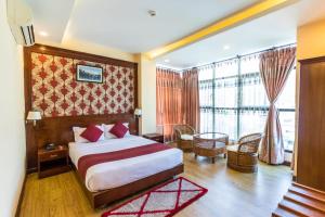 Cama o camas de una habitación en Hotel Pokhara Goodwill
