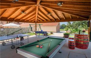 an overhead view of a patio with a pool table at Awesome Home In Hr-52215 Vodnjan With House Sea View in Vodnjan