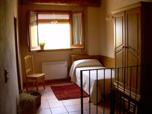 Łóżko lub łóżka w pokoju w obiekcie Casa Rural el Castellet