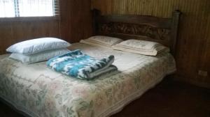 En eller flere senge i et værelse på La Gaviota BnB