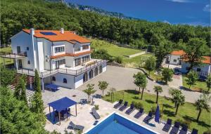 an aerial view of a house with a swimming pool at Gorgeous Home In Bribir With Outdoor Swimming Pool in Bribir