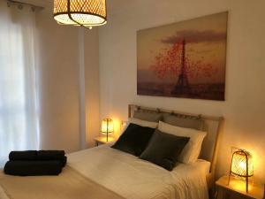 Posteľ alebo postele v izbe v ubytovaní Apartamento catedral A