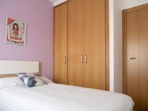 Postel nebo postele na pokoji v ubytování Villa Joan