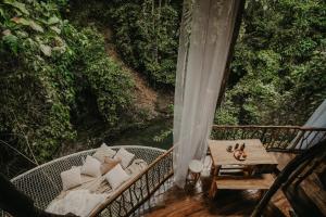 Χώρος καθιστικού στο Treehouse de Valentine