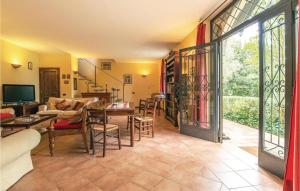 a living room with a couch and a table at Villa Lavinia in Vitorchiano