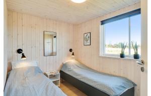 Postel nebo postele na pokoji v ubytování Gorgeous Home In Grenaa With Sauna