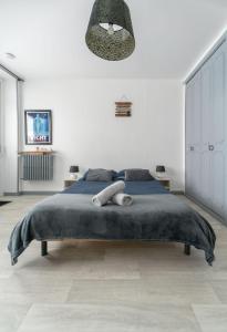 Postel nebo postele na pokoji v ubytování Le Venise - appartement design - centre ville - parcs