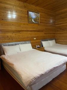 Letto o letti in una camera di Yun Hsiang Zhan Chalet