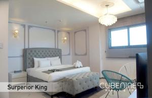 Letto o letti in una camera di Cube9 Resort & Spa 큐브9 리조트 & 스파