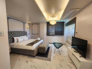 TV a/nebo společenská místnost v ubytování Cube9 Resort & Spa 큐브9 리조트 & 스파
