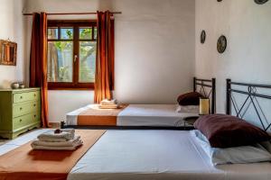 Postel nebo postele na pokoji v ubytování Porto Koufo Resort + 187 fotografií