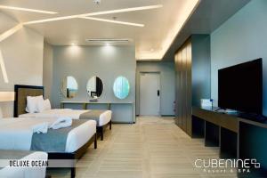 Letto o letti in una camera di Cube9 Resort & Spa 큐브9 리조트 & 스파