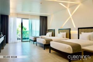 Letto o letti in una camera di Cube9 Resort & Spa 큐브9 리조트 & 스파