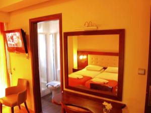Postel nebo postele na pokoji v ubytování Hotel Filoxenia