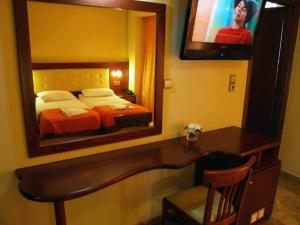 Postel nebo postele na pokoji v ubytování Hotel Filoxenia