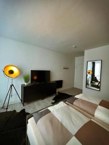 Postel nebo postele na pokoji v ubytování Talgarten Studio 4 + 1 fotografie