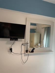 TV a/nebo společenská místnost v ubytování Lefteris Apartment