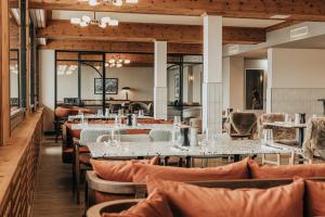 Posezení v ubytování Hotel Altein Arosa, a Faern Collection Resort
