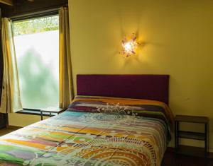 A bed or beds in a room at Casiñas de Acevedo