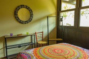A bed or beds in a room at Casiñas de Acevedo