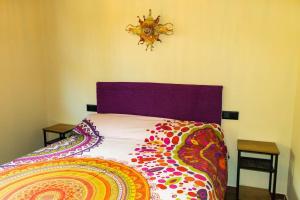 A bed or beds in a room at Casiñas de Acevedo