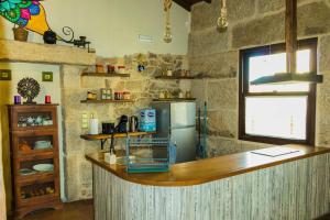 A kitchen or kitchenette at Casiñas de Acevedo