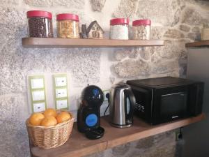 A kitchen or kitchenette at Casiñas de Acevedo