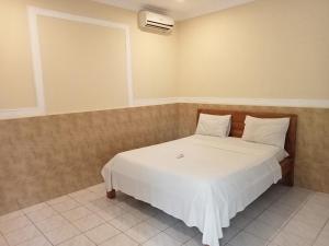 Postel nebo postele na pokoji v ubytování Homestay Lucu 2