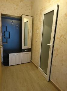 a bathroom with two sinks and a mirror at Прекрасен апартамент в София in Sofia