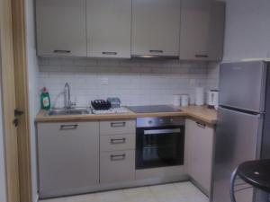 A kitchen or kitchenette at Casa memories