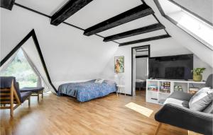 A seating area at Lovely Apartment In Gudhjem With Kitchen