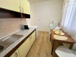 A kitchen or kitchenette at Simcity I free parking 24h self check-in