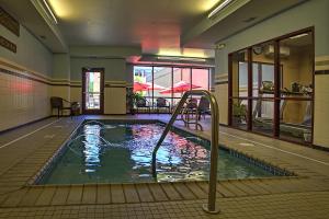 a swimming pool in the middle of a building at The Hotel Warner in West Chester