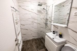 Kylpyhuone majoituspaikassa New Home Studio