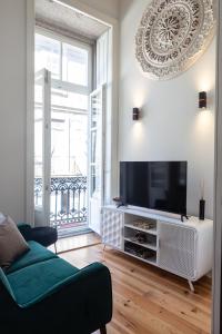 TV a/nebo společenská místnost v ubytování Cinema Luxury House
