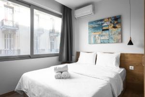 Posteľ alebo postele v izbe v ubytovaní Ipanema, Nilie Hospitality MGMT