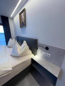 Postel nebo postele na pokoji v ubytování Ferienhaus Zentral
