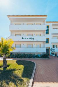 a building with a sign on the side of it at Recanto da Galé by Umbral in Albufeira